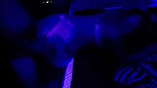 Black light fun with sexy pregnant MILF