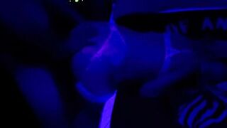 Black light fun with sexy pregnant MILF